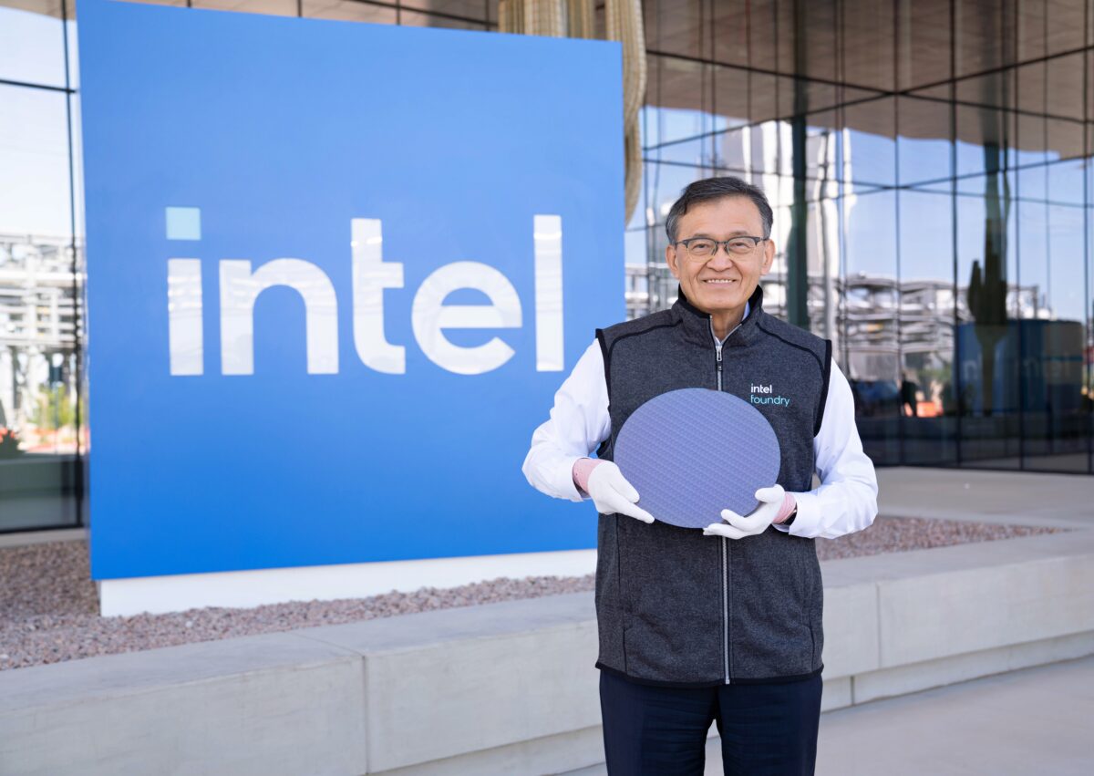 Intel CEO Lip-Bu Tan holds a wafer of Core Ultra Series 3 (Panther Lake) tiles built on the Intel 18A process node, outside the Intel campus in Chandler, Arizona